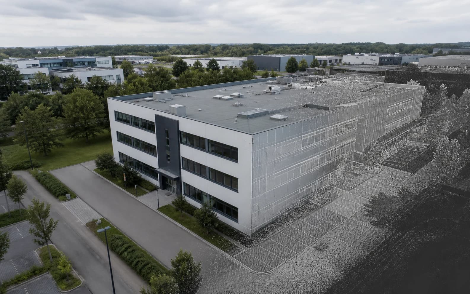 Gewerbegebäude mit dezentem digitalen 3D-Bestandsmodell